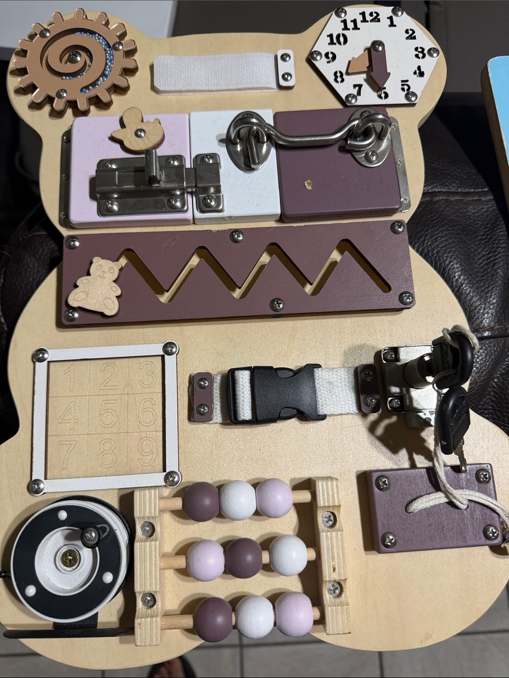 Wooden Busy Board Activity Toy - Purple, White, Cream